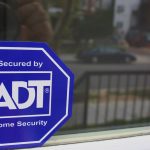 adt sign on a window
